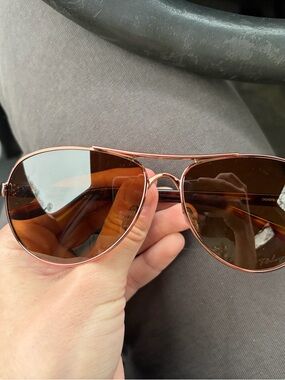 Oakley Rose Gold Aviator Sunglasses with Brown Lenses